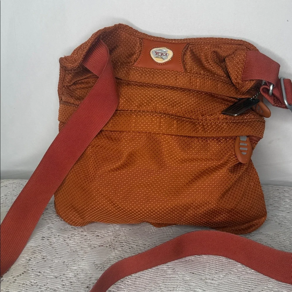 Tumi orange multiple zipper crossbody bag - Picture 3 of 10